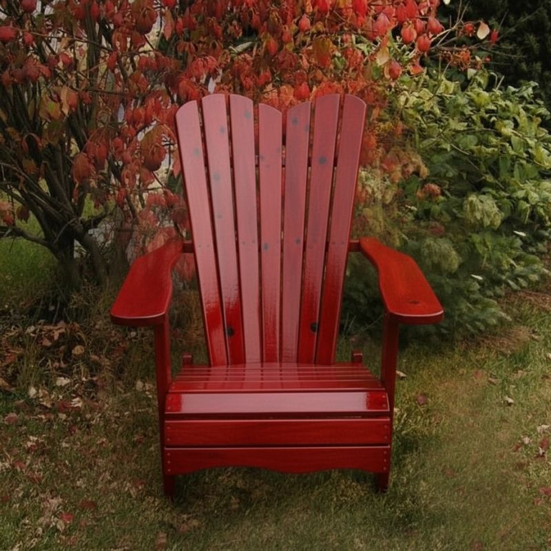 Wooden Adirondack chair on a patio with greenery in the background - wave back  mahogany glossy - knotted cedar