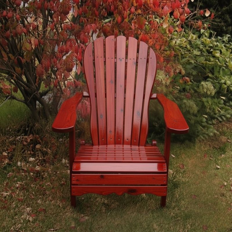 Wooden Adirondack chair on a patio with greenery in the background - sandal back  mahogany glossy - knotted cedar