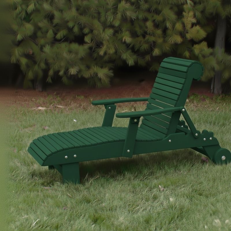Deluxe Lounge Chair on grass with green bushes in the background - poly luxe - turf green