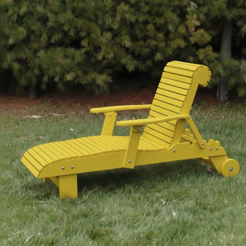 Deluxe Lounge Chair on grass with green bushes in the background - poly luxe - lemon yellow