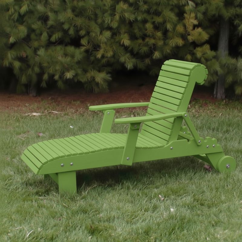 Deluxe Lounge Chair on grass with green bushes in the background - poly luxe - lime green