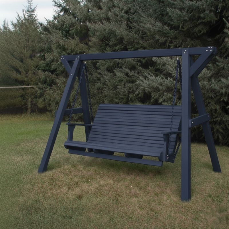Patriot blue Family Porch Swing with Frame set on grass with trees in the background