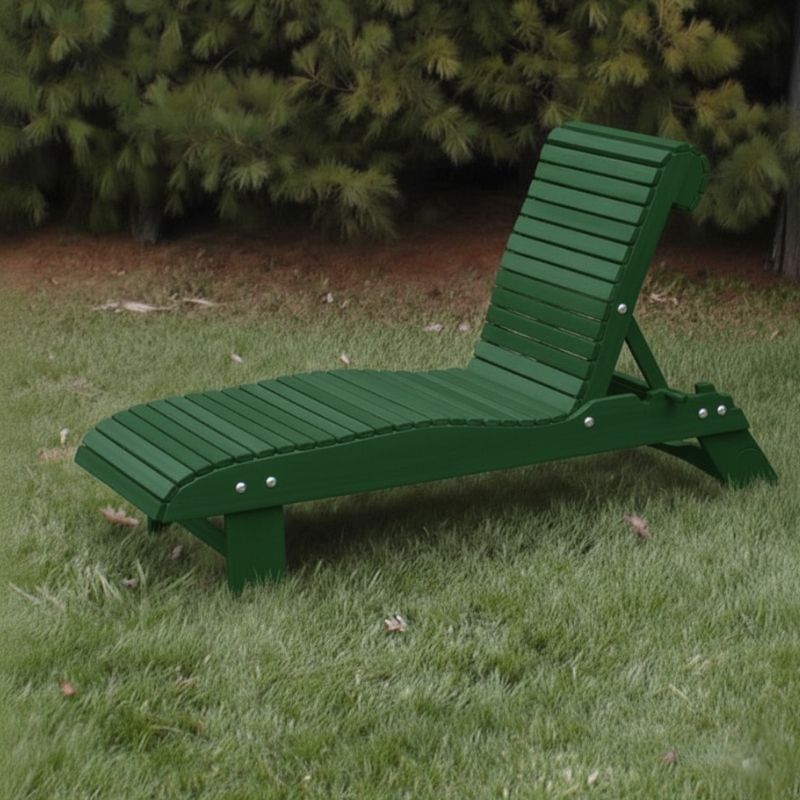 Lounge Chair on grass with trees in the background - poly luxe - turf green
