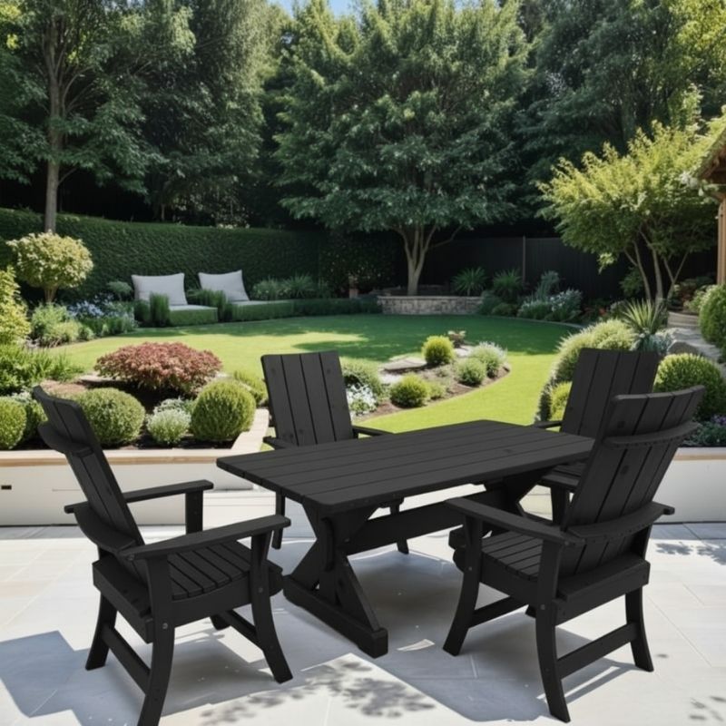 Black variant of Modern Dining Set for 4 with 6' Table on a patio, surrounded by a garden.