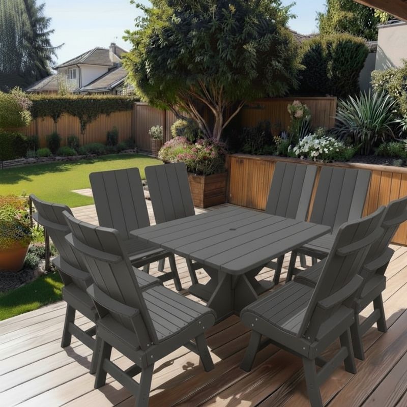 Modern Dining Set for 8 with Pedestal Table on a deck with a garden and house in the background - poly luxe - dark grey