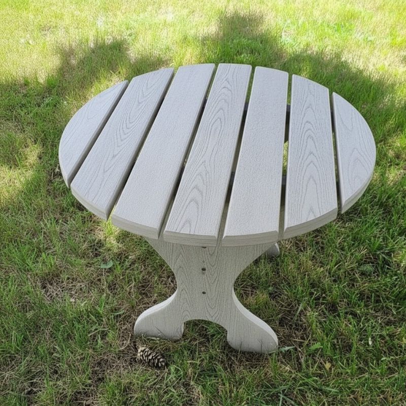 Round Side Table with slatted design on a grassy background - poly luxe - woodgrain driftwood grey