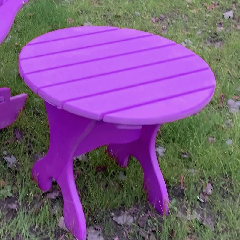 Round Side Table with slatted design on a grassy background - poly luxe - purple
