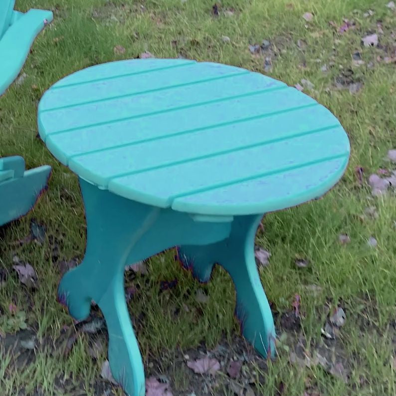 Round Side Table with slatted design on a grassy background - poly luxe - aruba blue