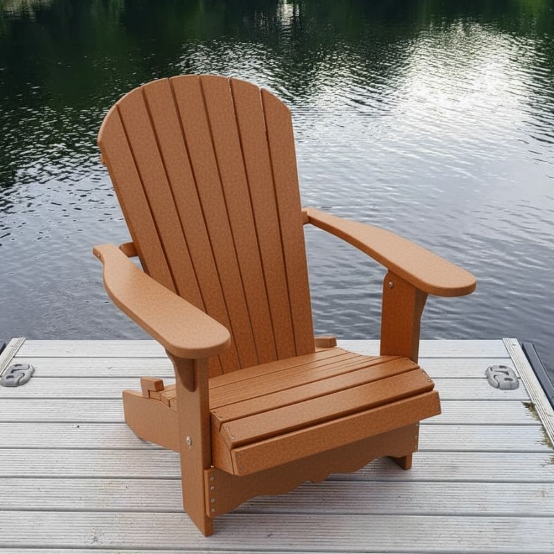 Royal Adirondack Chair (Large) on a dock by a body of water - poly luxe - cedar
