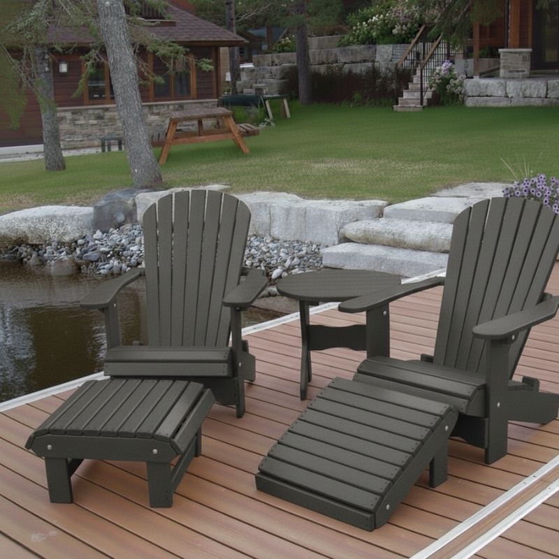 Royal Complete Patio Set on a wooden deck by a pond with a cabin in the background - poly luxe - dark grey