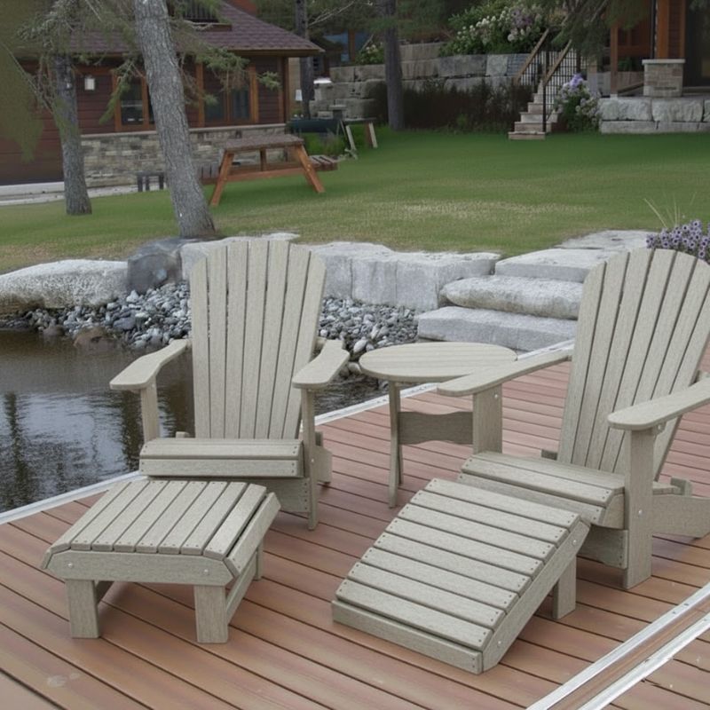 Royal Complete Patio Set on a wooden deck by a pond with a cabin in the background - poly luxe - woodgrain driftwood grey
