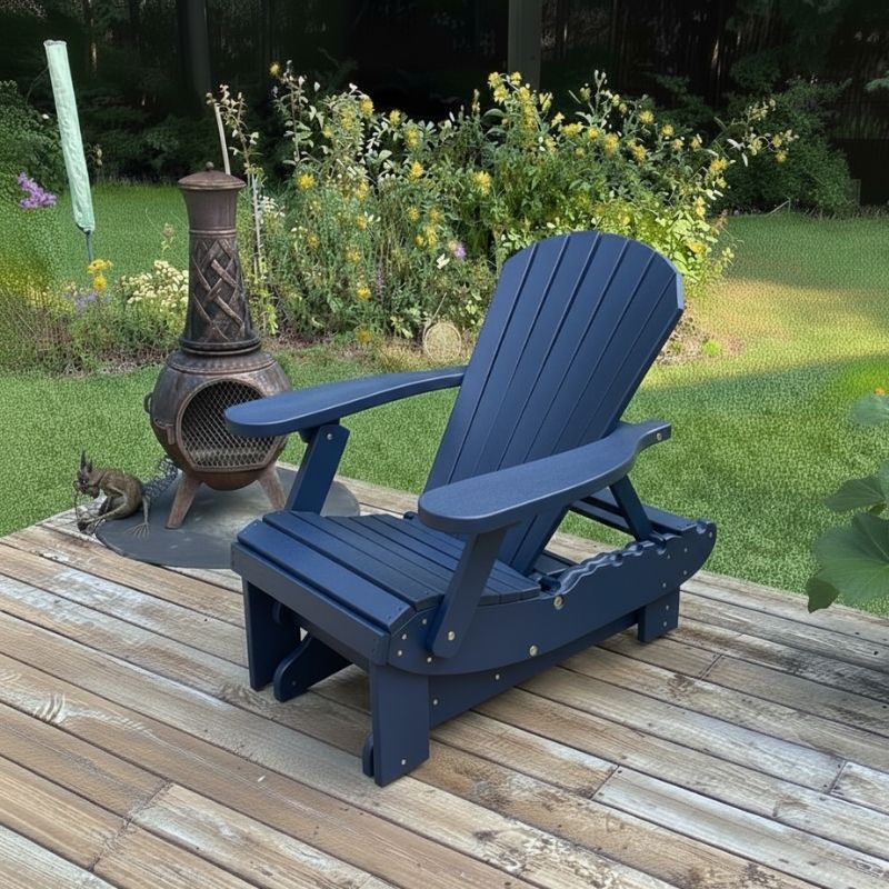 Royal Reclining Glider on a wooden deck with a garden background - poly luxe - patriot blue