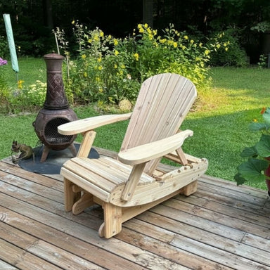 Royal Reclining Glider on a wooden deck with a garden background