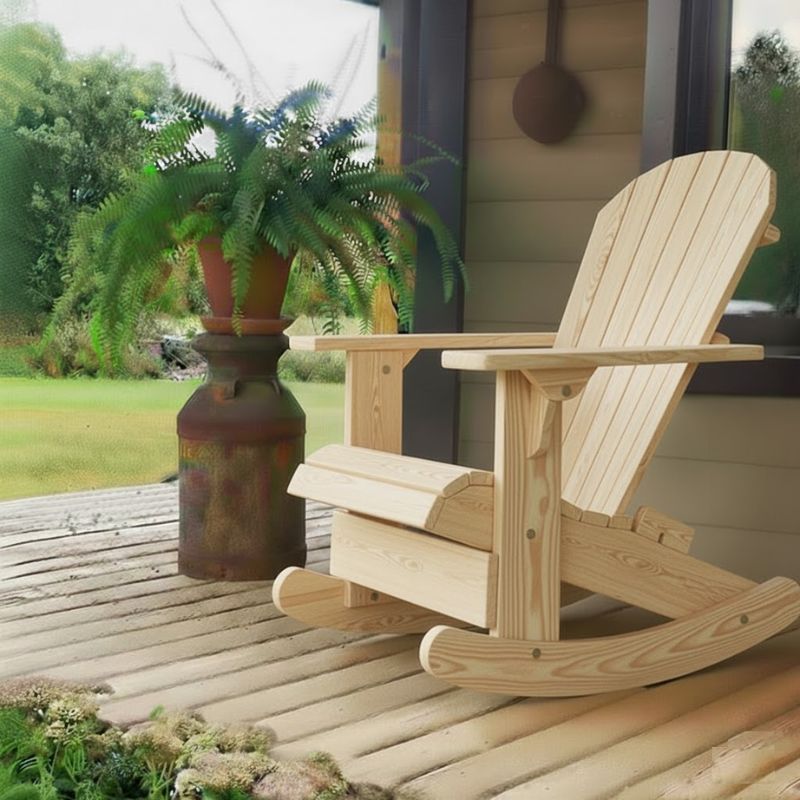 Royal Rocking Adirondack Chair (Large) on a porch with a potted plant and garden view - poly luxe - Birchwood