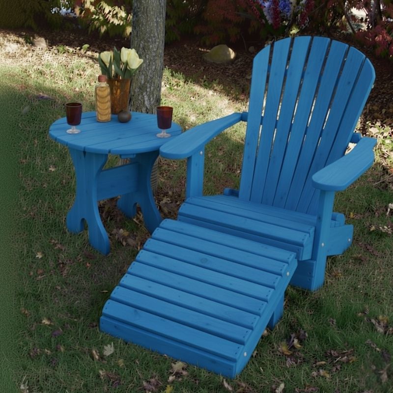Blue Royal Single Patio Set set on a grassy area with decorative items.