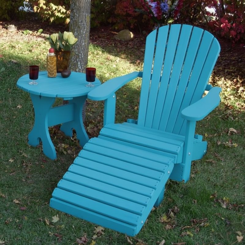 Aruba Blue Royal Single Patio Set set on grass with a tree in the background