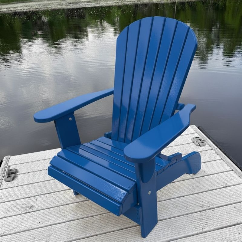 Adirondack chair on a wooden dock by a body of water - poly luxe - blue
