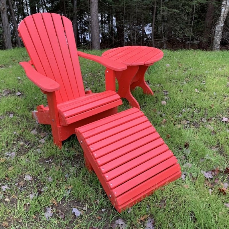 Red Royal Single Patio Set set with table and footrest on grass