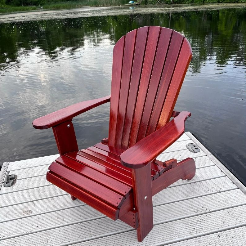 Royal Upright Adirondack Chair, on a dock by a body of water
