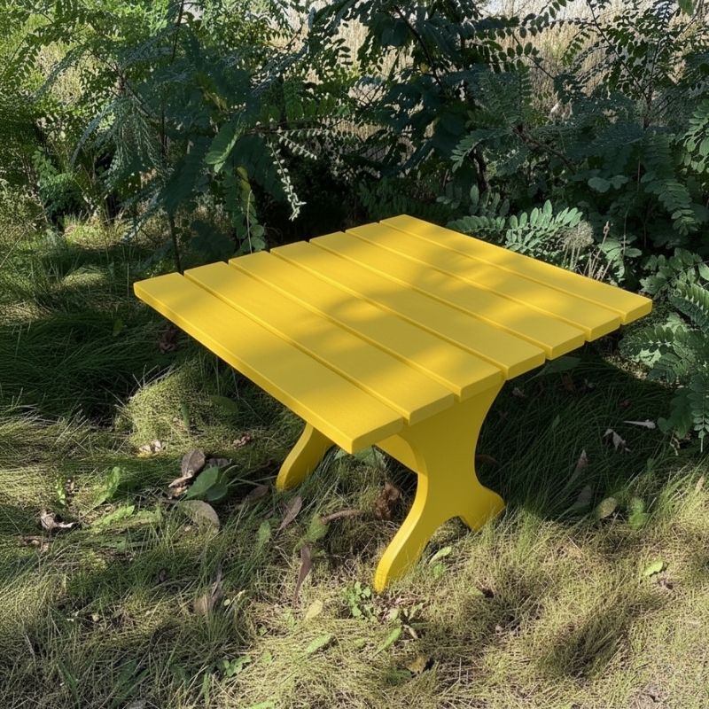 24" Square Side Table in a natural outdoor setting with greenery - clear cedar - golden glossy in a natural setting with greenery - poly luxe - lemon yellow