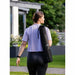 Image of Acon Eco-friendly Yoga Mat rolled up with cross chest-strap.