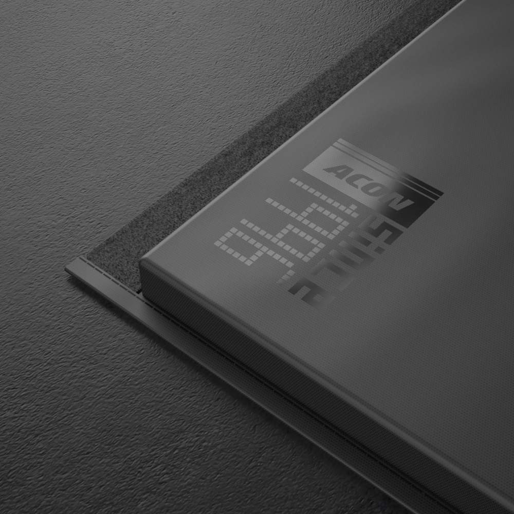 A close up of a logo in the corner of Black Edition Acon Gym Mat