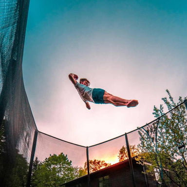 Boy bouncing on ACON 16 HD Trampoline