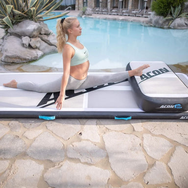 Woman stretching on ACON Airtrack and ACON Airblock