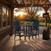 Outdoor setting of Patriot Blue Bistro Set Comfort Bundle on a deck during sunset.