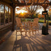 Outdoor setting of Chedar Bistro Set Comfort Bundle on a deck during sunset.