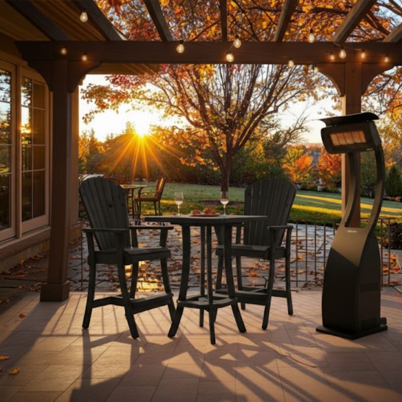 Outdoor setting of Black Bistro Set Comfort Bundle on a deck during sunset.