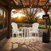Outdoor setting of White Bistro Set Comfort Bundle on a deck during sunset.