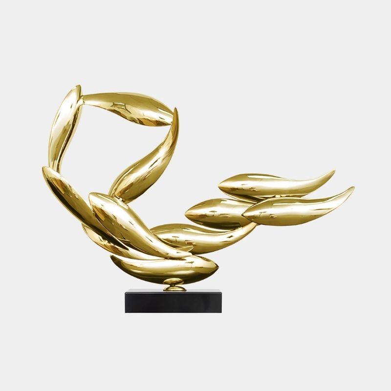 Breeze Gold Organic Abstract Steel Sculpture in a clean background