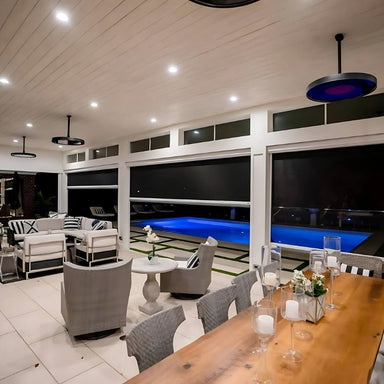 Modern indoor setting installed on ceiling, blue light pool on the background