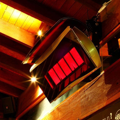 Red heating element in a wooden room