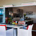 Tungsten Electric Heater, Matte White Colour mounted on Exterior wall of Restaurant Patio