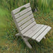 Camp Chair in a grassy outdoor setting - woodgrain driftwood grey