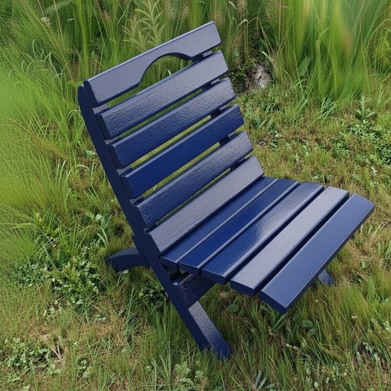 Camp Chair in a grassy outdoor setting - poly luxe - patriot blue