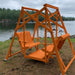 Orange Classic Garden Swing set by a lake on a cloudy day
