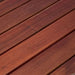 Close-up of wooden slats with a reddish-brown color.