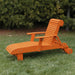 Deluxe Lounge Chair on grass with green bushes in the background - poly luxe - orange