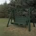 Turf green Family Porch Swing with Frame set on grass with trees in the background