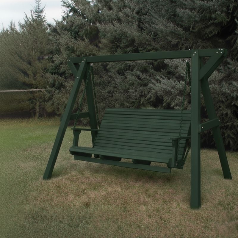 Turf green Family Porch Swing with Frame set on grass with trees in the background