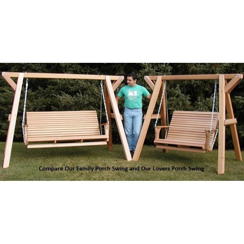 Two wooden porch swings on stands with a person standing between them, set against a green outdoor background.