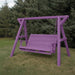 Purple Family Porch Swing with Frame on grass with trees in the background