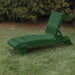 Lounge Chair on grass with trees in the background - poly luxe - turf green