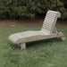 Lounge Chair on grass with trees in the background - poly luxe - woodgrain driftwood grey