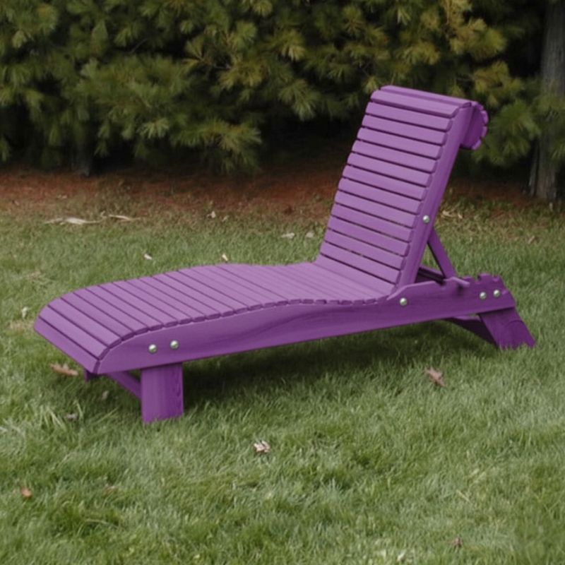 Lounge Chair on grass with trees in the background - poly luxe - purple