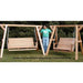 Wooden porch swing set with a person standing next to it, comparing family and lovers swings.