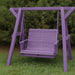 Lovers Porch Swing with Frame Purple Variant in outdoor set up, with grass and trees.